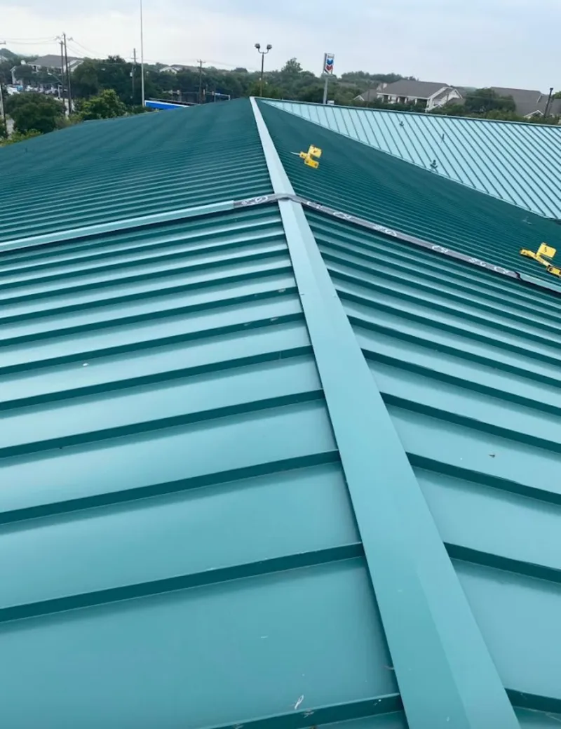 Green commercial metal roof ridge and valley for Metal Roof Repair in Temple Terrace